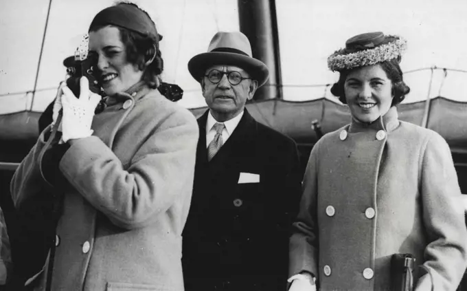 Two Daughters Of U.S. Ambassador Arrive -- Eunice Kennedy taking film shots at Plymouth, watched by her sister Rosemary and Mr. Edward Moore, their father's assistant, on arrival on the Manhattan.Miss Rosemary and Miss Eunice Kennedy, Daughters of the new U.S.A. Ambassador in London, Landed at Plymouth from New York today. They are going to school here. April 26, 1938. (Photo by Keystone).