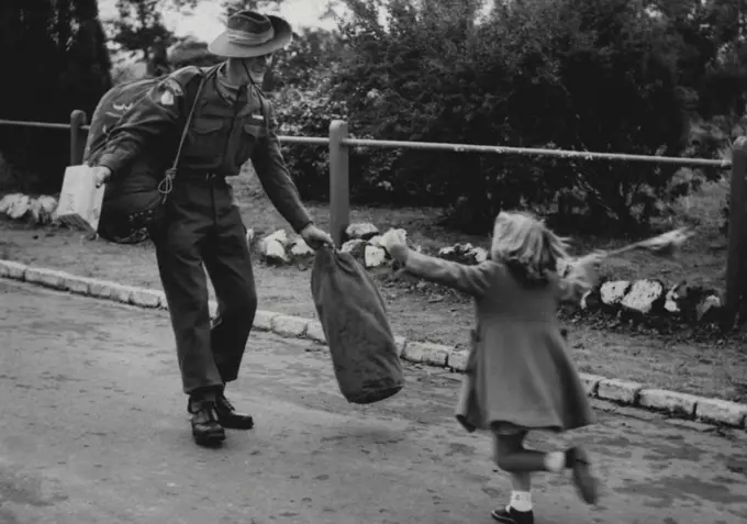 They're Home! -- Australian Fighting Men from Korea came home to Melbourne today. Royal Park, where they got their pay and leaves passes, saw many touching re­unions. None was more joyous than this - when Janice Parker, 5, spotted her uncle, Pte. Kevin Falkingham, of Bayswater. April  15, 1953. (Photo by Bruce Reddaway).