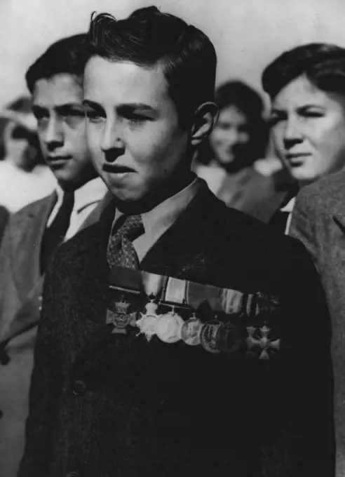 Morris Smith, son of the late Sgt. Izzy Smith, V.C., wore his father's decorations at the Shrine today. The decorations are (from left): Victoria Cross, Mons Star, Service Medal, Coronation Medal, Delhi Durbar Medal, Victory Medal, Russian Cross of St. George, and Croix ***** with palm. April 29, 1945.