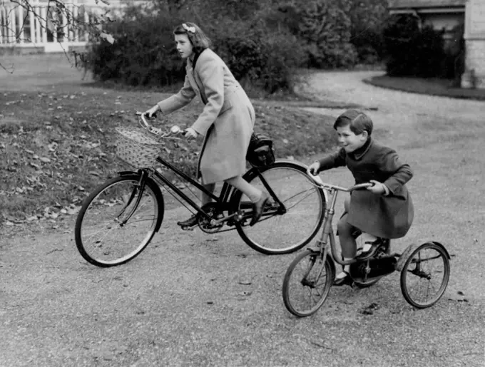 Duchess Of Kent's Children at Home -- Princess Alexandra (right) photographed with Prince Michael in the Grounds of Coppins with their cycles.Two of the children of the Duchess of Kent were photographed at their home at "Coppins" at Iver, Buckingham. Princess Alexandra is to be one of the Bridesmaids, and Prince Michael an attendant Page, and Forthcoming marriage of Princess Elizabeth to Lieutenant Philip Mountbatten, which takes place in Westminsster abbey, London on 20th November. October 31, 1947.