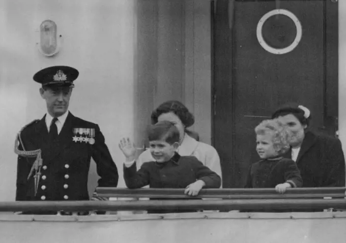 A Royal Wave -- A close-up of the young travelers waving to The Queen Mother and Princess Margaret, who were at Portsmouth to see them off, from aboard the "Britannia".Two excited children T.R.H. Prince Charles and Princess Anne today boarded the Royal yacht at "Britannia" at Portsmouth. The children are sailing to Tobruk a journey of 2800 miles to join their parents H.M. The Queen and H.R.H. The Duke of Edinburgh. This, the Royal children have been out of this country. April 14, 1954. (Photo by Fox Photos).
