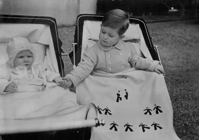 "There's Nothing to be afraid of," says Prince Charles as he affectionately holds Princess Anne's hand during a recent London outing Prince Charles, who adores Princess Anne, calls her "Baby Sister." August 23, 1951. (Photo by Kosmos Bureau Pty. Ltd.).