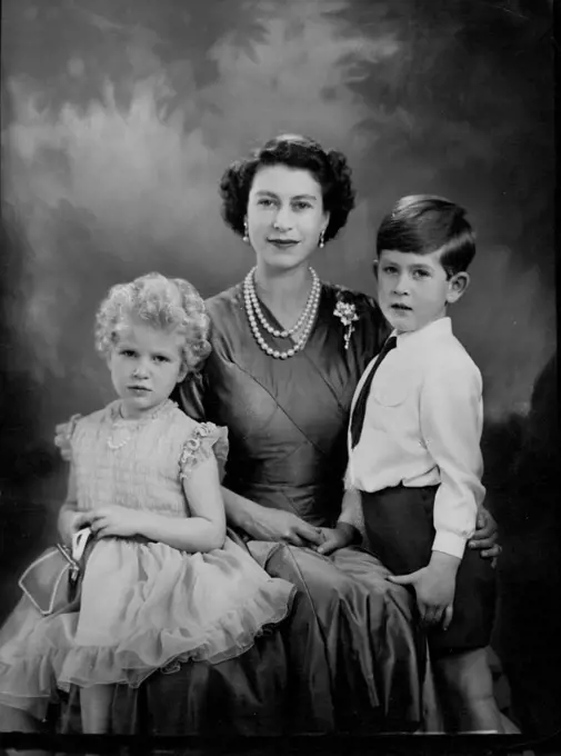 H.M. The Queen With H.R.H. Prince Charles And H.R.H. Princess Anne.A new and charming study of her majesty, with T.R.H.'s Prince Charles and Princess Anne. December 26, 1954. (Photo by Marcus Adams, The London Electrotype Agency Ltd.).