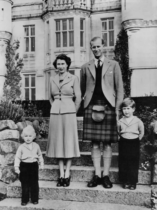New Picture Of The Royal Family -- This new picture of the Royal Family was taken recently in front of Balmoral Castle in Scotland.The kilted Duke of Edinburgh lays a controlling finger on the shoulder of Prince Charles who is dressed similarly to his younger sister, Princess Anne.When the queen and the Duke saw this picture they decided: "This is out Christmas card, we shall keep it for that. January 21, 1953. (Photo by Associated Press Photo).
