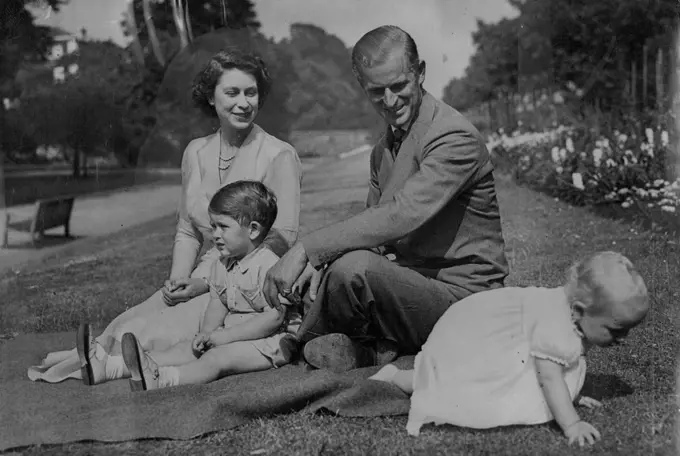 Princess Duke And The Children New PicturesPrincess Elizabeth and the Duke of Edinburgh watch with a smile as Princess Anne makes a determined attempt to crawl out of the picture. Prince Charles is gazing steadfastly at a point of interest elsewhere.Happily informal are these her pictures of Princess Elizabeth her husband in the Duke of Edinburgh and their children, taken at Clarence House, the family's London residence.Princess Anne will be one year old the on August 15; Princes Charles will be three of age on November 14. The family, recently reunited duke returned from service with the Royal Navy in the Mediterranean, will be together until the Royal parents sail on September 25 to visit Canada and the United States. August 16, 1951. (Photo by Reuterphoto).