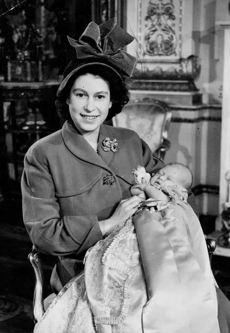 Baby Prince Christened At Buckingham Palace :A happy picture of Princess Elizabeth and her infant son Prince Charles taken in Buckingham Palace after the Christening ceremony today.Prince Charles, as Princess Elizabeth's son will be known to the nation, was christened Charles Philip Arthur George in a ceremony at Buckingham Palace, London this afternoon (Wednesday) when Dr. Fisher, Archbishop of Canterbury officiated Prince Charles's sponsors were: The King, Queen Mary, Princess Margaret, King Haakon of Norway, Prince George of Greece, the Dowager Marchioness of Milford Haven, Lady Brabourne and the Hon. David Bowes-Lyon. December 15, 1948. (Photo by Reuterphoto).