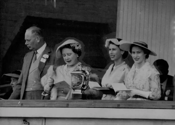 Royal Family With The Hunt Cup -- Seen with the Hunt Cup in the Royal Box at Ascot this afternoon, June 16, are Queen Elizabeth II, Elizabeth the Queen Mother, Princess Margaret and the Duke of Gloucester. June 16, 1954. (Photo by Associated Press Photo).