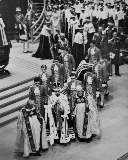 The Coronation Ceremony In Westminster Abbey -- The King carrying the Orb and Sceptre leaving the Abbey after the ceremony. May 12, 1937. (Photo by Sport & General Press Association Limited).