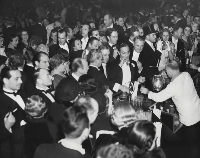 At The Met Bar -- Here is a general view showing opening night patrons at the bar at the Metropolitan Opera House in New York City, Nov. 29. 1937. January 29, 1954. (Photo by The Associated Press).
