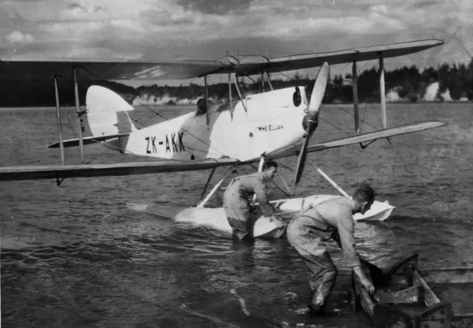 Intrepid Airman Sets Out On A Flight From N.Z To Australia.Chichester's plane being launched at the Hobsonville air base early on Saturday morning last. April 22, 1931. (Photo by The Auckland Daily News).