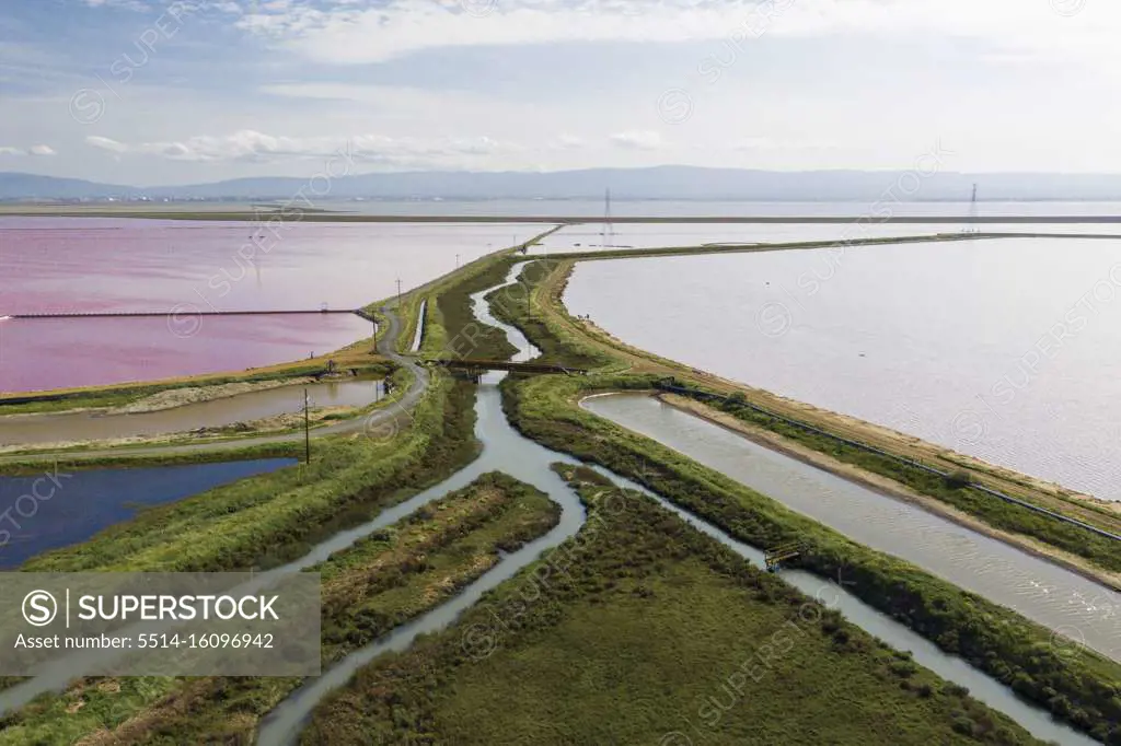 Multi Colored Water in Ponds and Stream in Salt Marsh in SF Bay Aerial