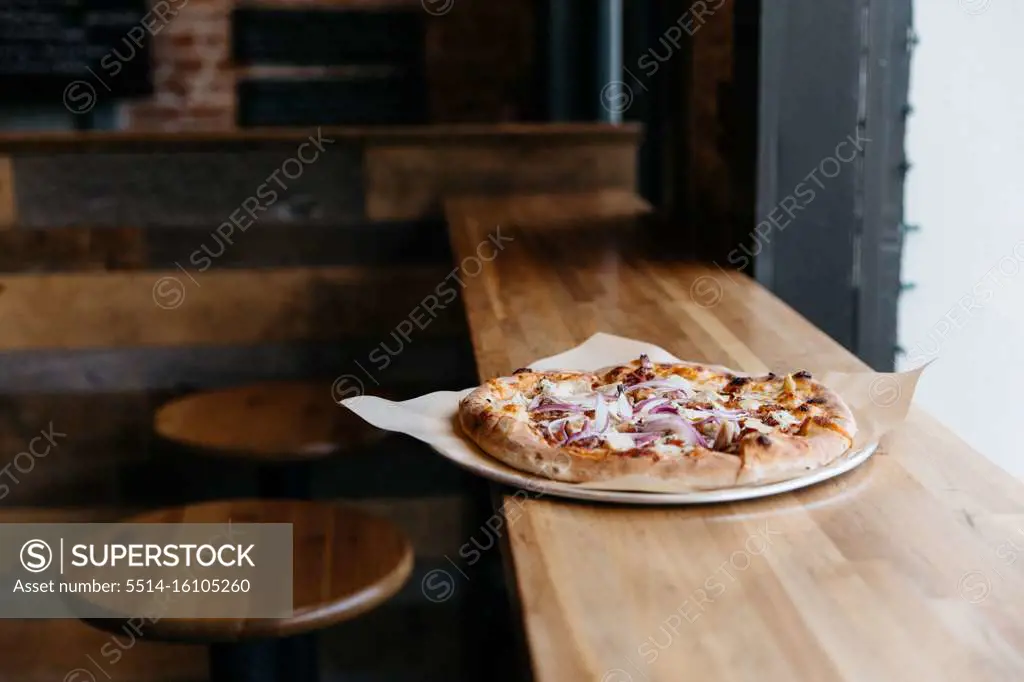 Handmade Pizza on Wood Table