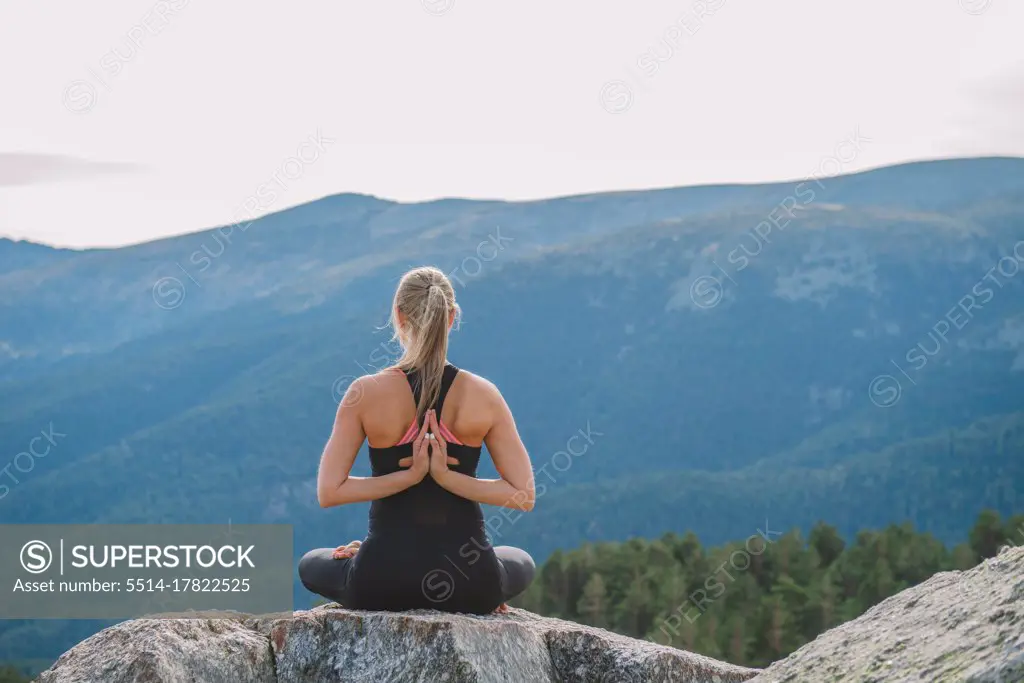 woman meditating yoga mountain postures