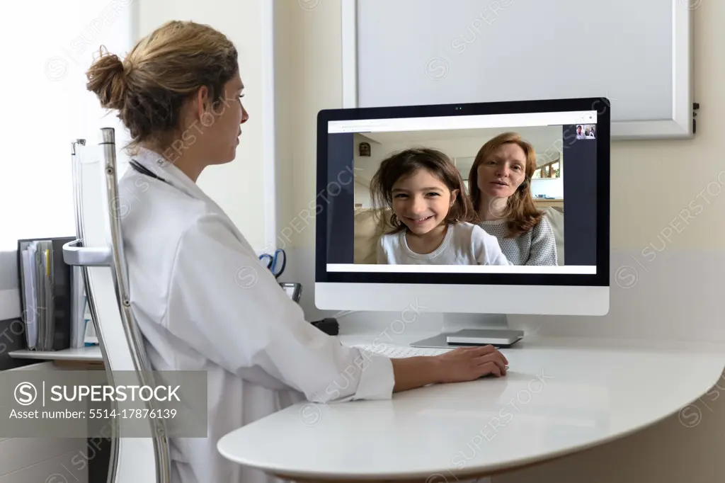 a doctor talks online with a mom