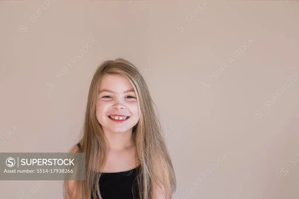 Close up of a young girl smiling