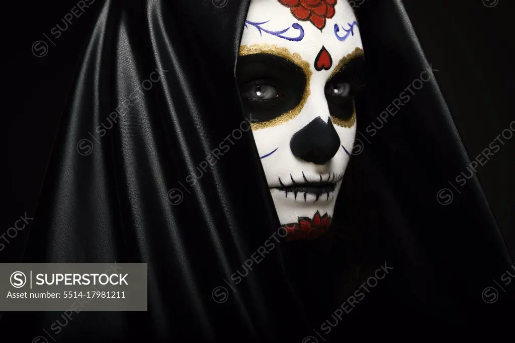 Sugar skull headshot against black background