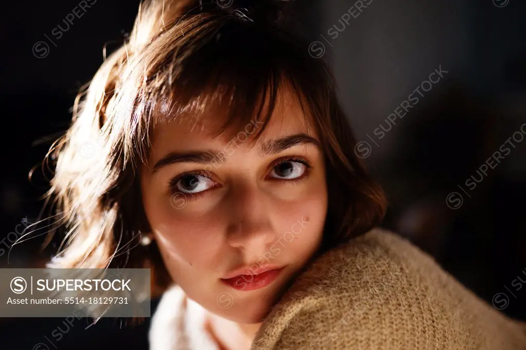 night portrait of a brown-eyed woman
