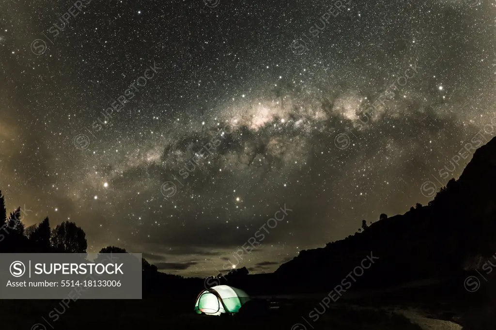 Night sky in New Zealand with Milky Way and tent