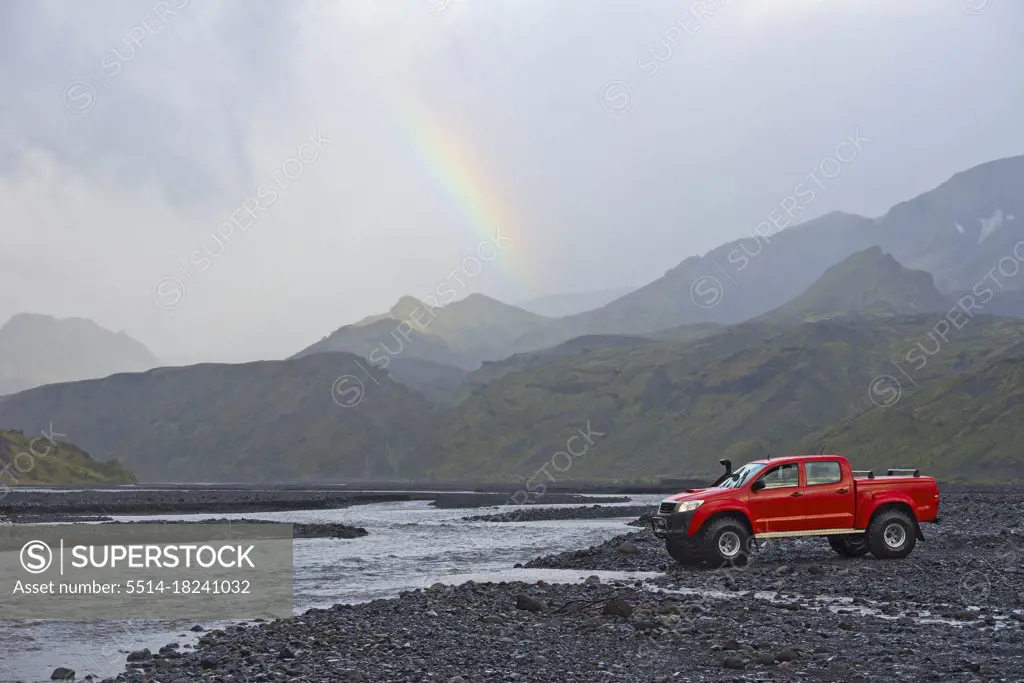 modified pick up truck driving on the Icelandic highlands