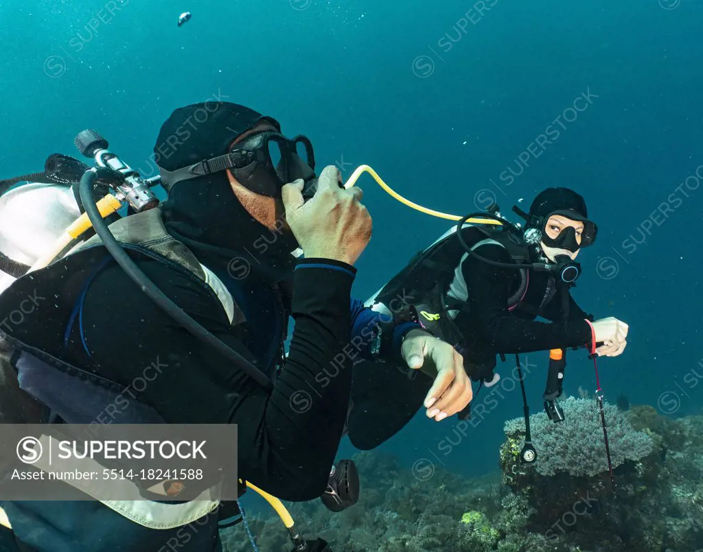 divers sharing air in emergency training in Raja Ampat / Indonesia