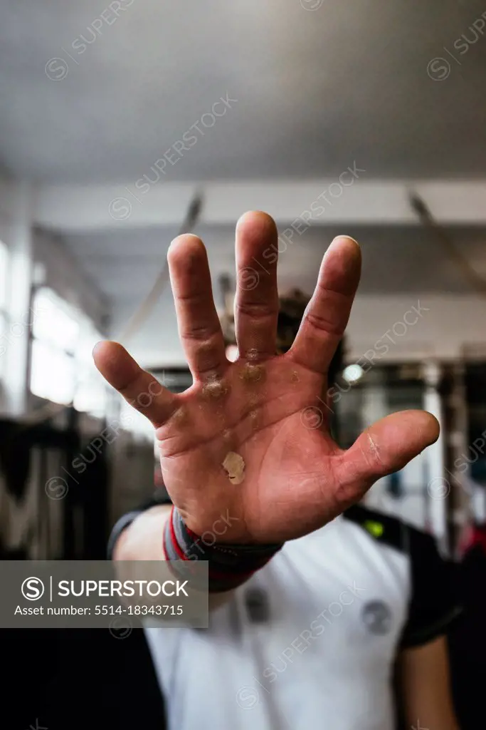 Athlete man's hand after intense training