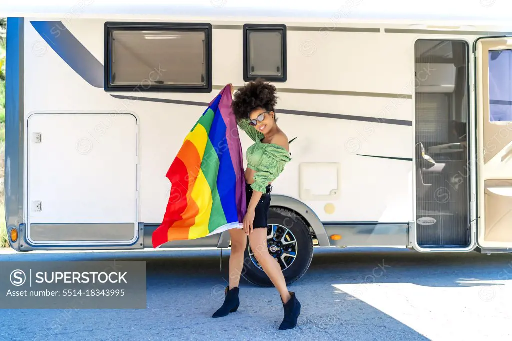 pretty proud african woman with her gay flag