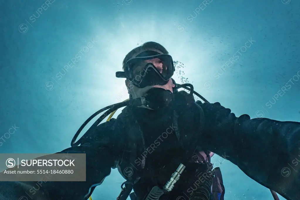 diver taking selfie in the tropical waters around Phuket