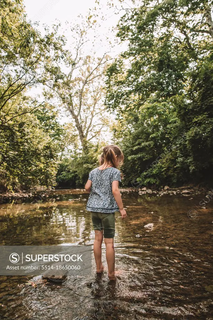 playing in the creek in the summer