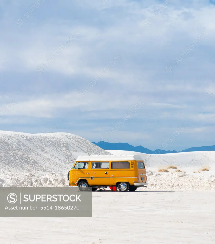 Yellow RV Camper Van In White Sands National Monument, New Mexico