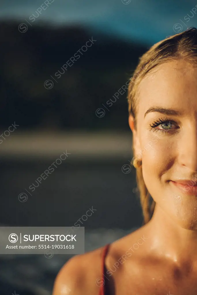 half face portrait of a beauty girl with blue eyes