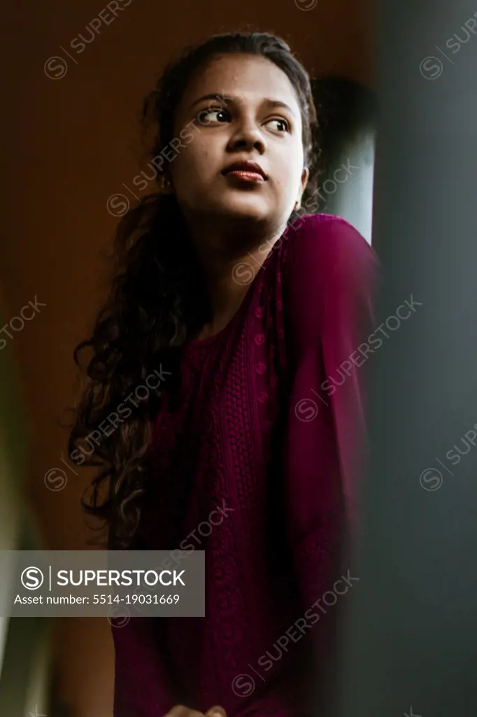 Portrait of a girl in violet dress