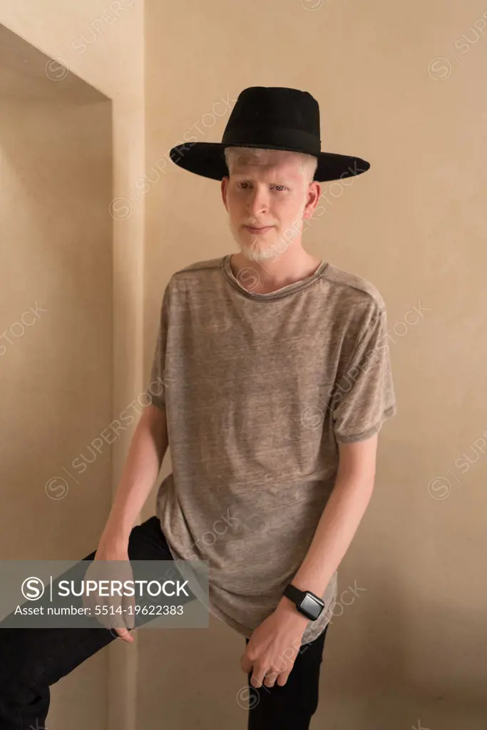 Albino man wearing hat portrait