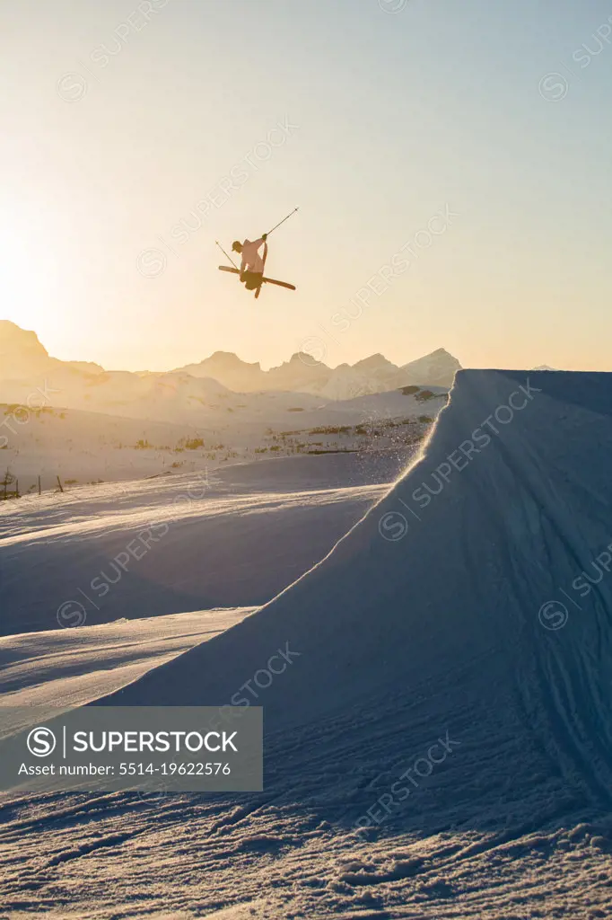 Skier Hitting Hip Jump in Banff Alberta Canada