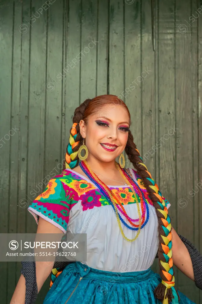 Mexican woman with folk costume for traditional dance