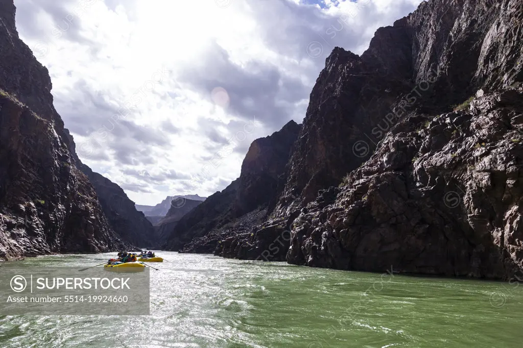 Rafts rowing through the Grand Canyon