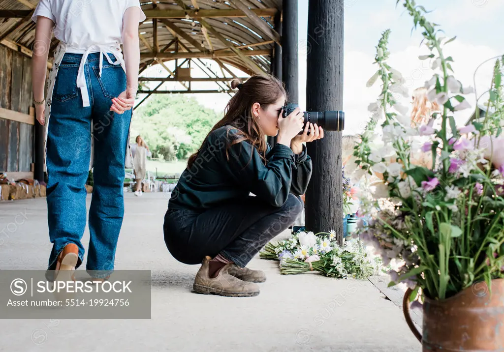 behind the scenes of a photographer working at a photoshoot