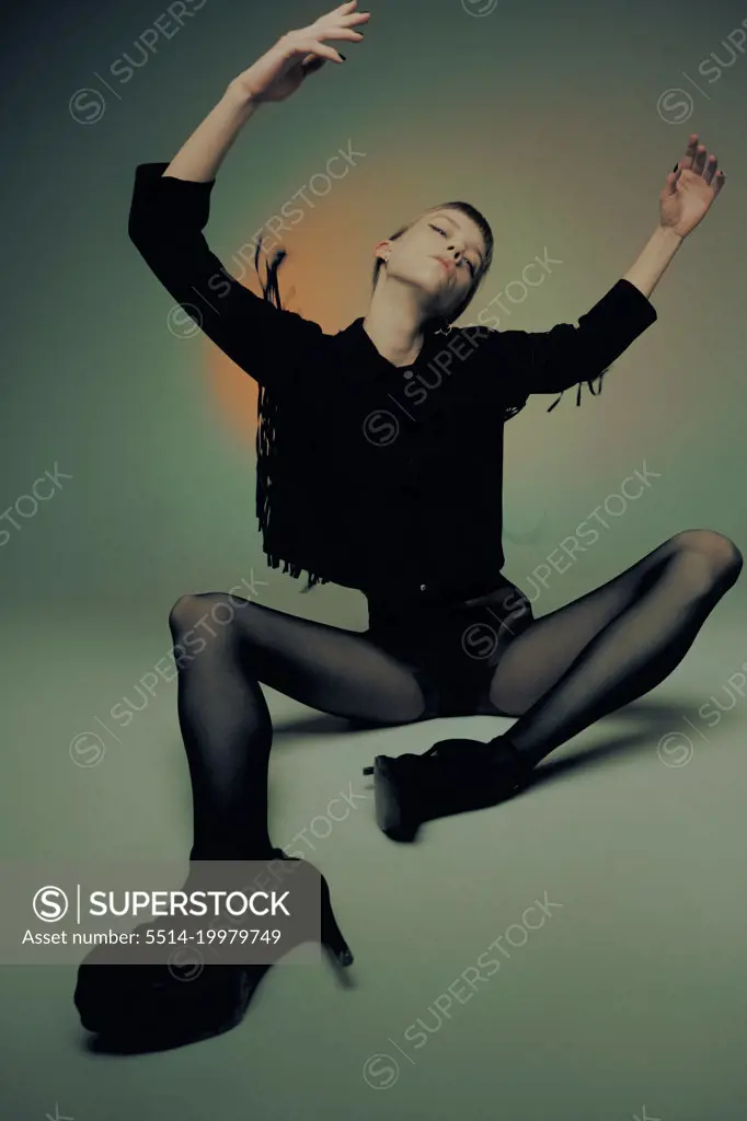 Model with a bang wearing black tights