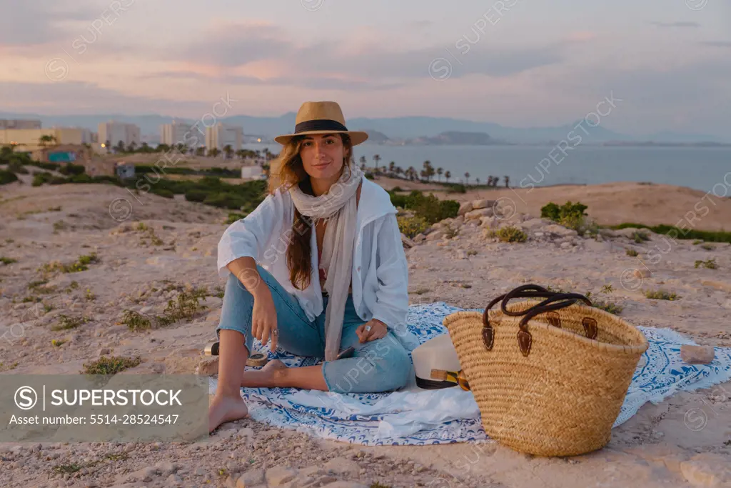 young woman picnic on her vacation trip