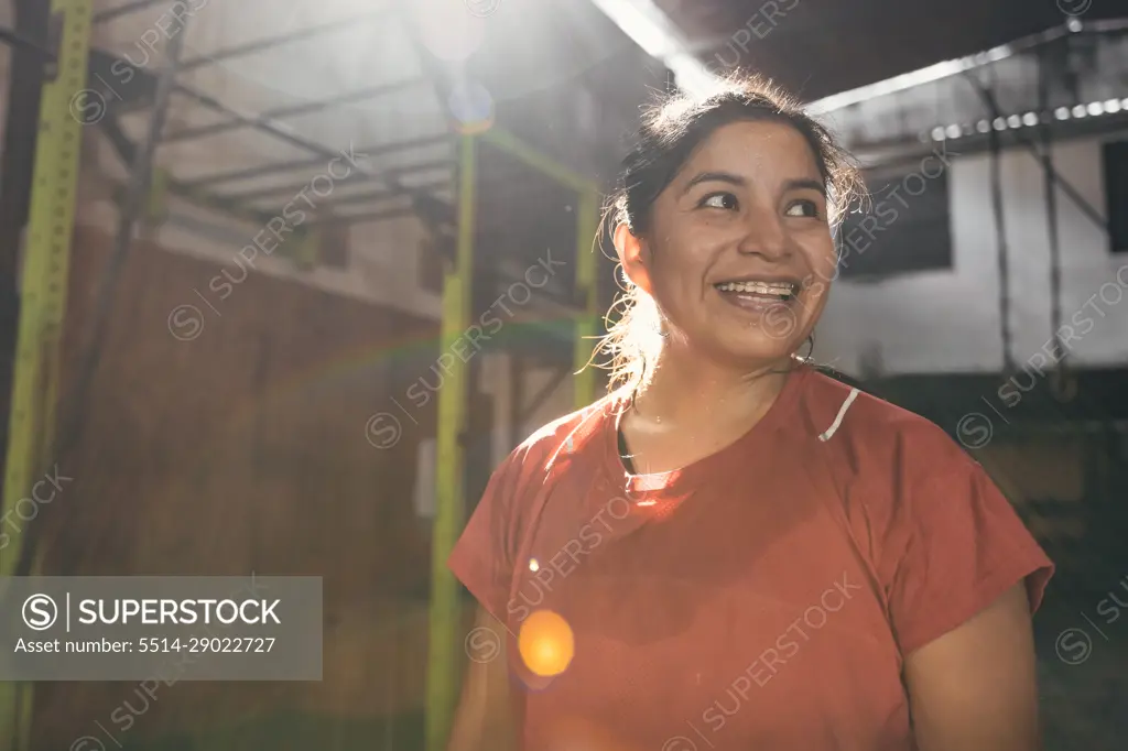 Sweaty latin woman after working out in the gym. Peru.
