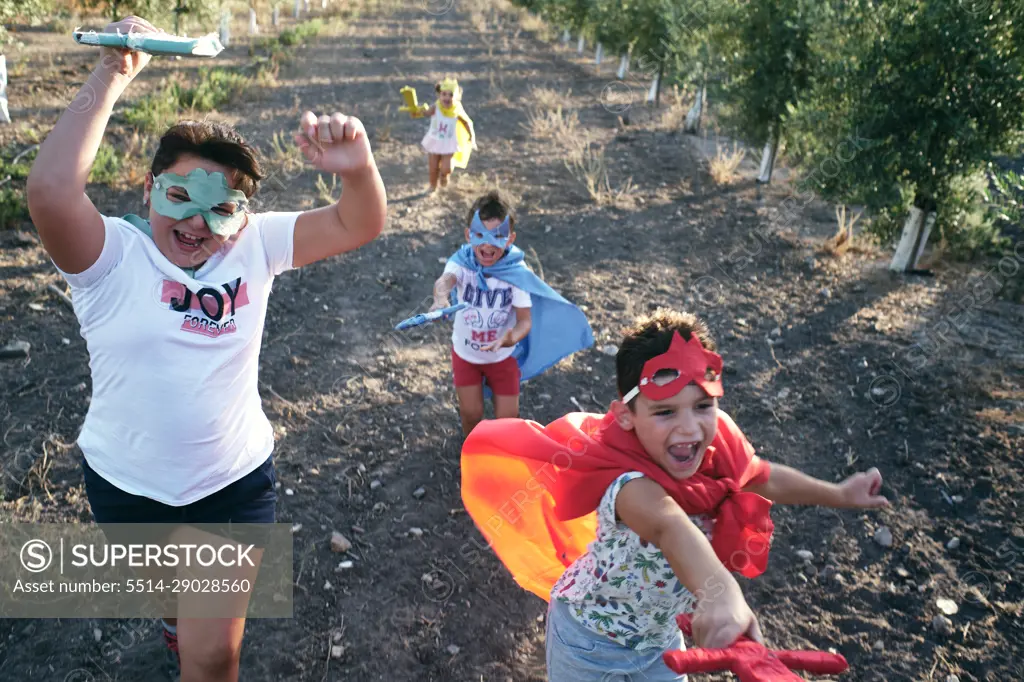 children run around pretending to be superheroes and fight demons