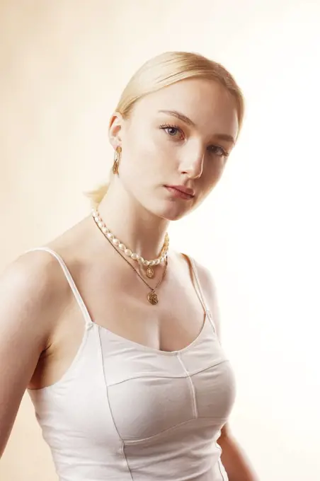 Studio portrait of young blonde woman