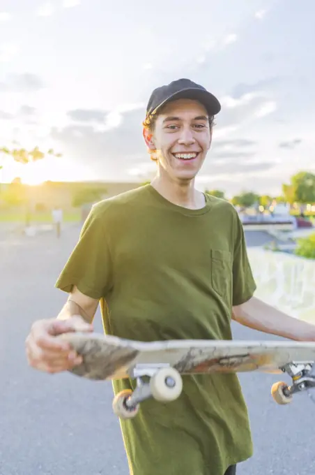 Portrait of young skateboard enthusiast