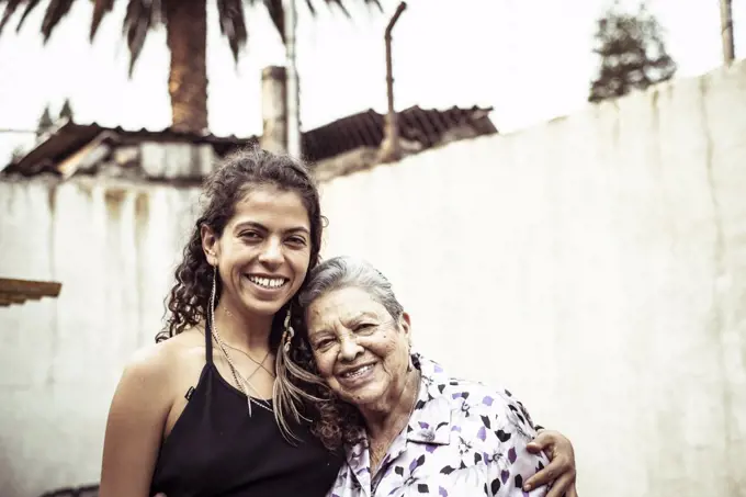 Smiling family portrait of Mexican female generations
