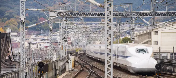 Japanese high speed train Shinkansen entering the station