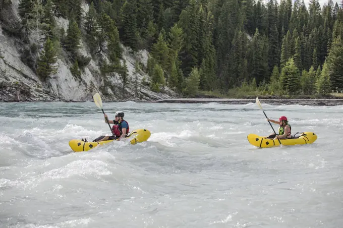 Man and woman paddling in British Columbia, Canada.
