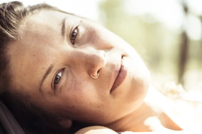 dreamy intimate summer portrait of woman relaxing in Portugal