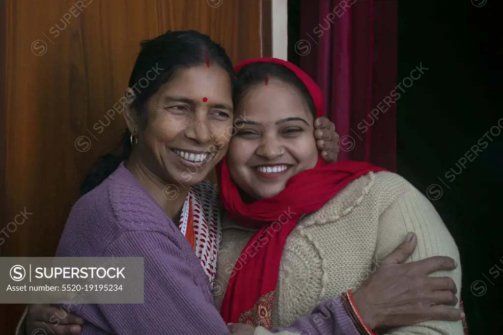 indian mother and daughter hugging each other, India