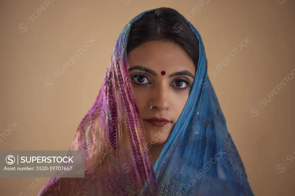 Portrait of an Indian woman in colourful veil
