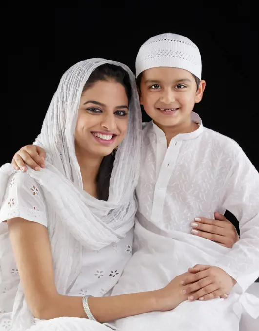 Portrait of a Muslim woman with her son