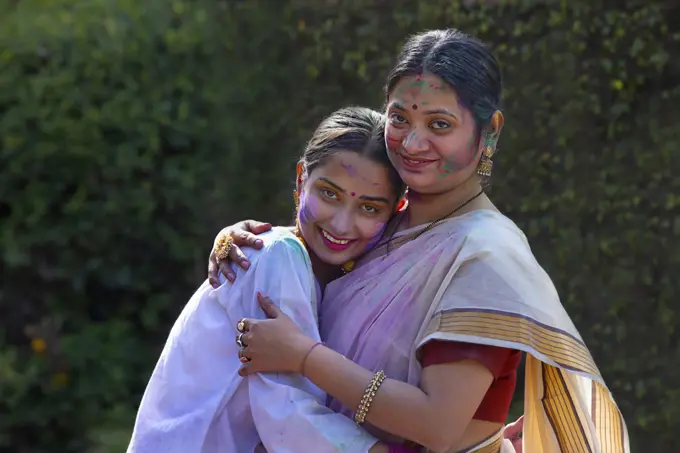 Mother-in-law hugging her daughter-in-law on the occasion of Holi